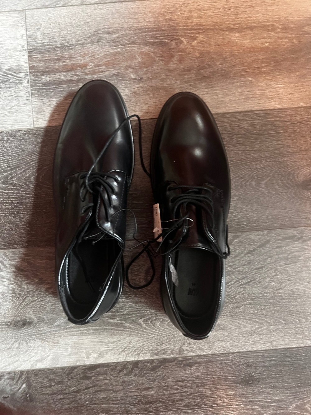 H&M Men’s size 10.5 black dress shoes.